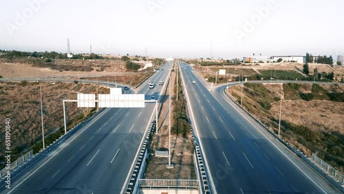 Top view to the cars driving on multi-level highway on the sunset. Mersin. O51 photo