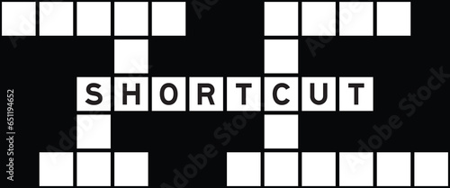 Alphabet letter in word shortcut on crossword puzzle background