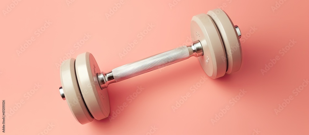 Dumbbell on isolated pastel background Copy space Dumbbell on isolated pastel background Copy space