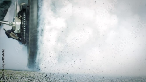 Motorbike burnout, Biker on a motorcycle drifts in smoke, burns tire on a motorcycle.
