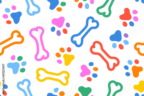 Fun colorful dog footprint with bone pattern. Dog paw doodle seamless pattern vector wallpaper background.