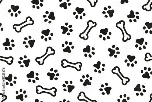 Seamless pattern with silhouette dog footprints and bone. Black and white dog paw doodle abstract pattern. 