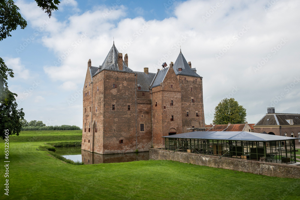 Slot Loevestein castle fort. medieval building used by military as a base as well as a state prison is now a museum and function centre for public access. historical landmark on sunny summer day