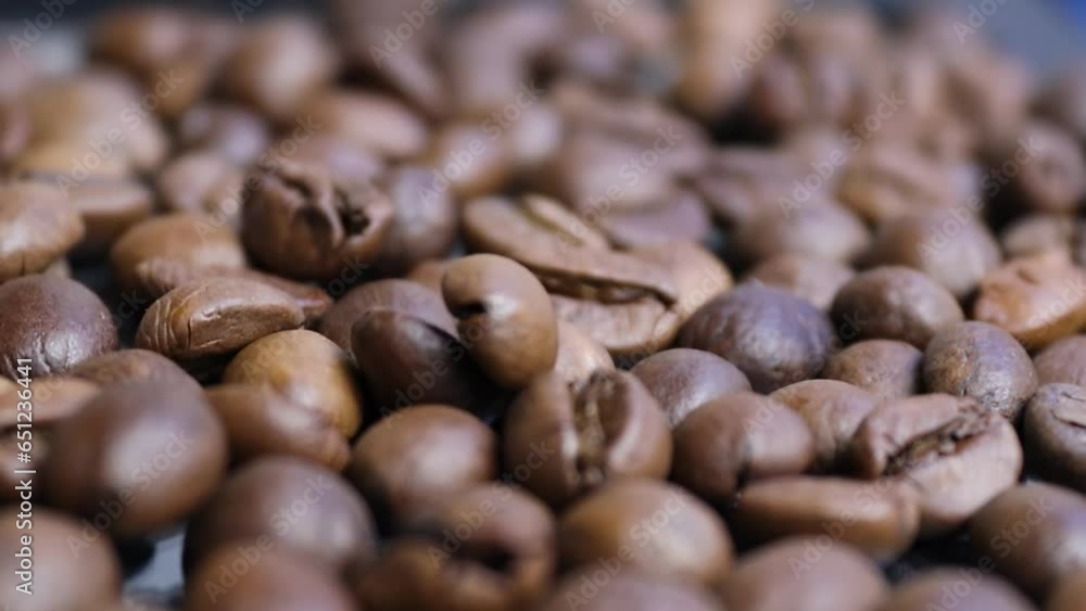 slow motions soft blurred close-up of falling coffee beans background slow motions soft blurred close-up of falling coffee beans background