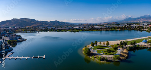 Fototapeta Naklejka Na Ścianę i Meble -  Aerial view of the Sparks Marina park with Mt. Rose and Slide mountain in the background during early Autumn.