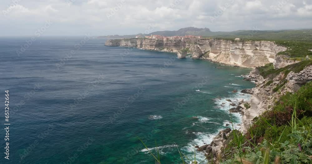 Corsica France, Bonifacio, steep cliffs, Blue Ocean Waves , Flowers, green pastures, Mediterranean, 4K Corsica France, Bonifacio, steep cliffs, Blue Ocean Waves , Flowers, green pastures, Mediterranean, 4K