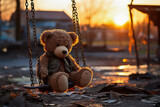Nostalgic scene of an abandoned teddy bear on an empty swing in a playground during a emotive sunset, depicting loneliness and childhood memories.