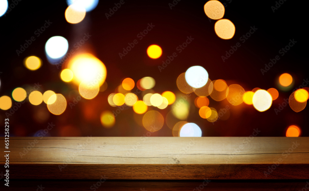 Christmas Bokeh Background - rustic wooden table and Magic golden blurred holidays lights - Backdrop for product presentation