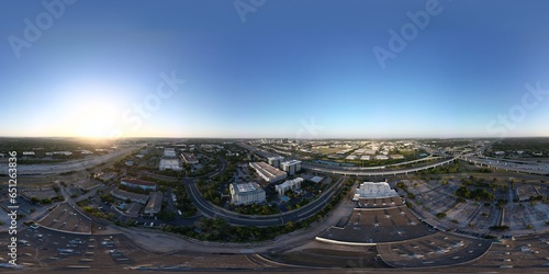 Sunset over the city and hill country. Clear blue skies. Orange sun. Vistas and panoramas.