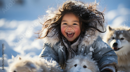 Captivating image of a joyful Inuit child, wide-eyed with excitement and jubilance, elatedly sledging in snowy Arctic, epitomizing pure thrill and overjoyed childhood. photo