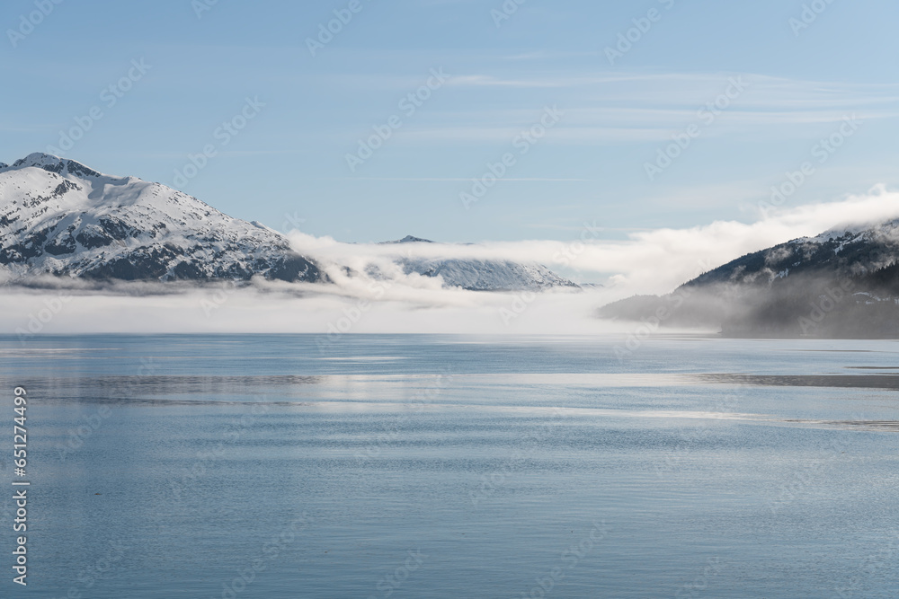 Fog on the mountains and sea in Passage Canal, Whittier, Alaska USA Fog on the mountains and sea in Passage Canal, Whittier, Alaska USA