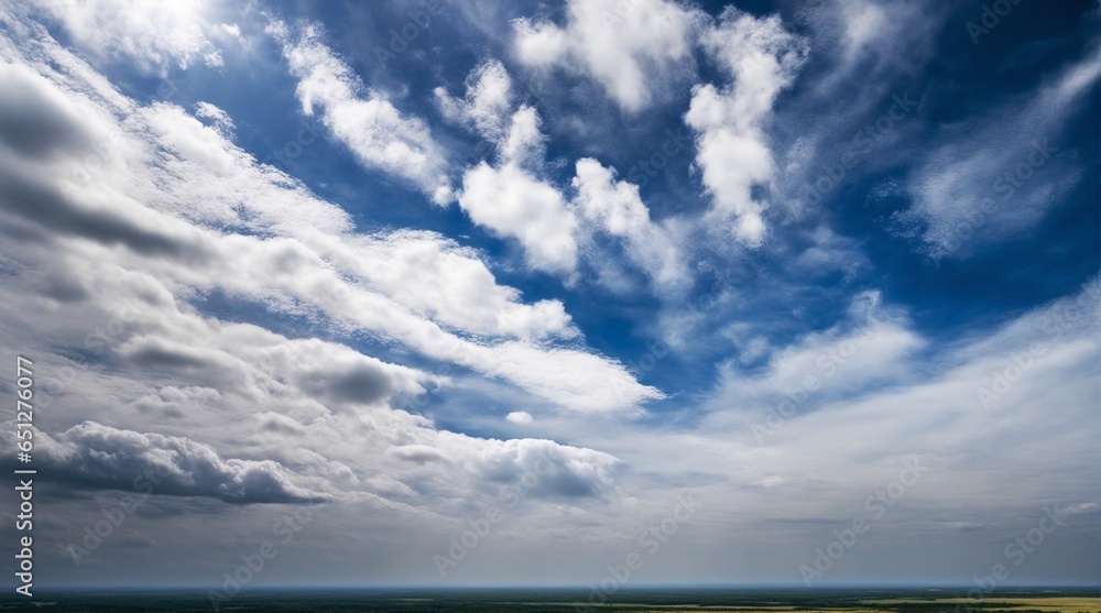 White Clouds Against a Clear Background White Clouds Against a Clear Background