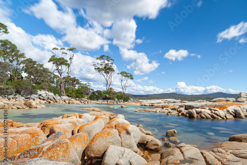 Stunning red coloured boulders, located in the Bay of Fires, Tasmania, Australia