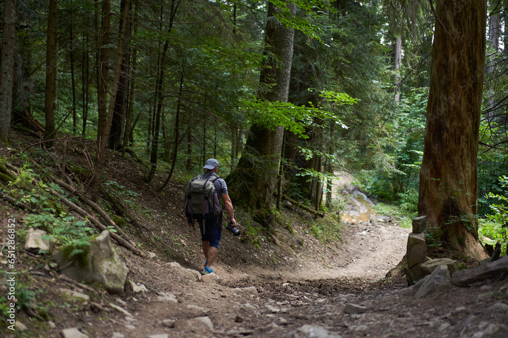 Professional nature photographer hiking