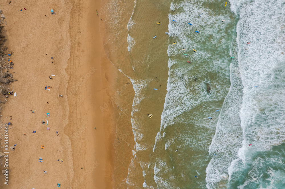 Surf on Altantic Ocean waves, Algarve, Portugal. Aerial drone view Surf on Altantic Ocean waves, Algarve, Portugal. Aerial drone view