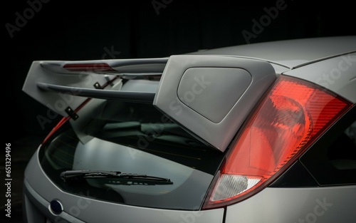 Rear spoiler on a hatchback car photo