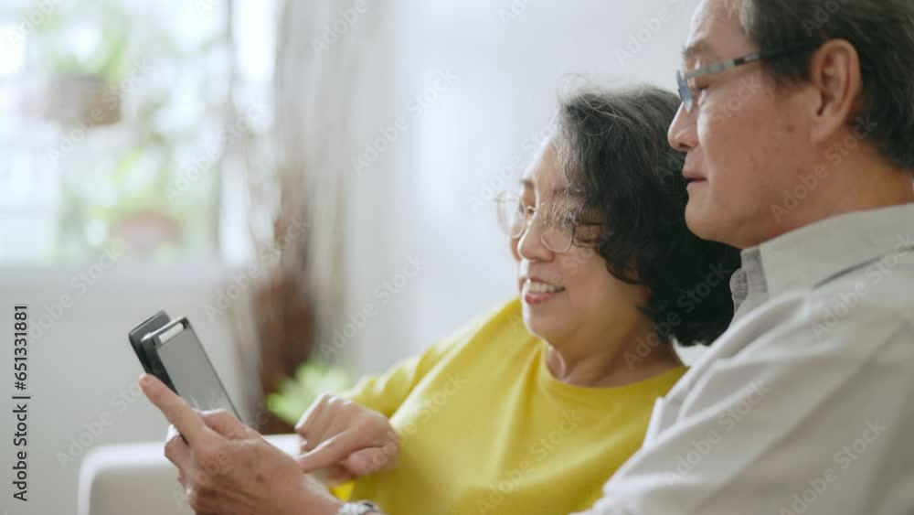 Elderly couple connecting with their distant daughter through a video call using tablet. Elderly couple connecting with their distant daughter through a video call using tablet.