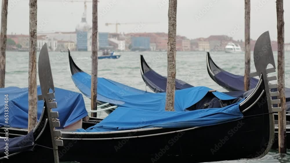 Venice, Italy - Gondolas and gondoliers in the San Marco basin and in the canals of the historic center under the Bridge of Sighs Venice, Italy - Gondolas and gondoliers in the San Marco basin and in the canals of the historic center under the Bridge of Sighs