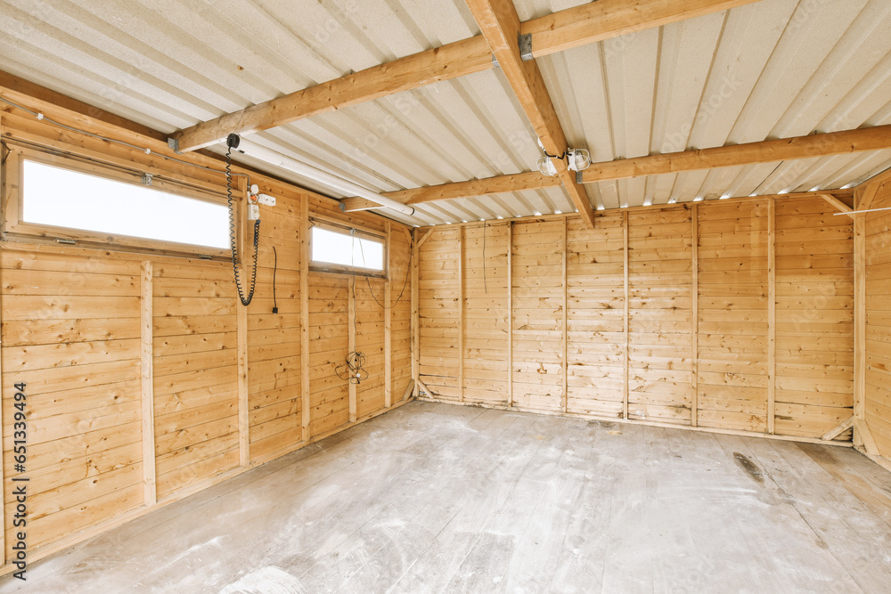 Empty unfinished room with wooden walls Empty unfinished room with wooden walls