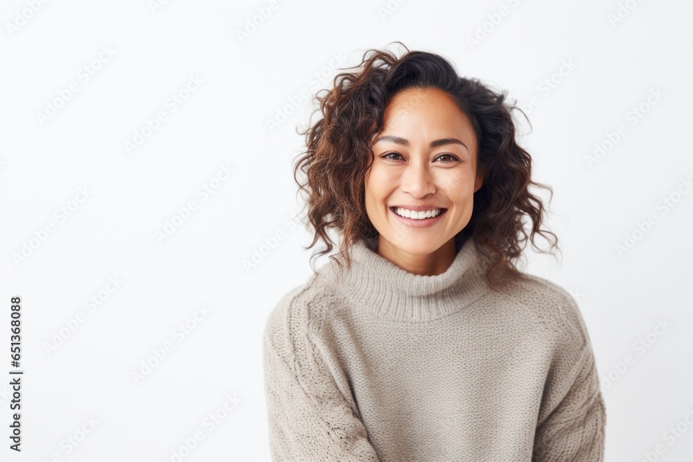 Lifestyle portrait photography of a Vietnamese woman in her 30s wearing a cozy sweater against a white background Lifestyle portrait photography of a Vietnamese woman in her 30s wearing a cozy sweater against a white background