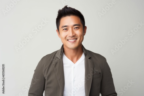 Group portrait photography of a Vietnamese man in his 30s against a white background