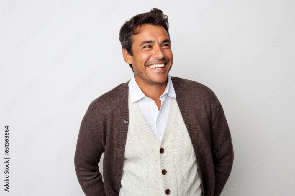 Portrait photography of a happy Peruvian man in his 30s against a white background Portrait photography of a happy Peruvian man in his 30s against a white background