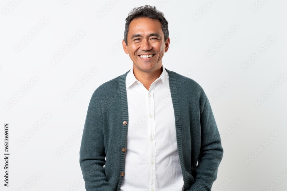Portrait photography of a happy Peruvian man in his 40s against a white background Portrait photography of a happy Peruvian man in his 40s against a white background