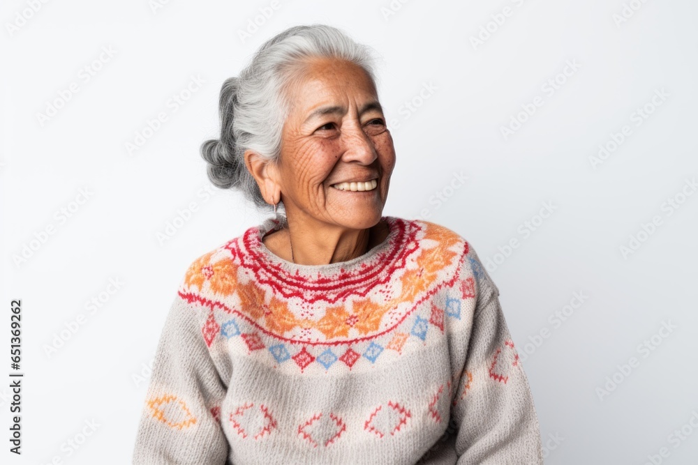 Medium shot portrait photography of a Peruvian woman in her 90s wearing a cozy sweater against a white background Medium shot portrait photography of a Peruvian woman in her 90s wearing a cozy sweater against a white background