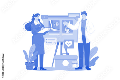 Male doctor discussing with a female intern