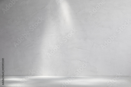 Empty austere concrete podium background with rays of light or sunbeams on it