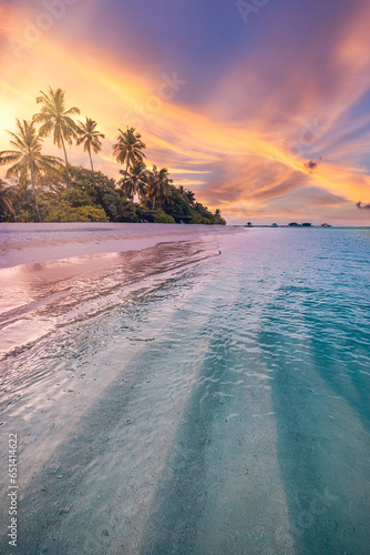 Majestic closeup view of calm sea water waves. Panoramic orange sunrise sunset sunlight. Tropical island beach landscape, exotic coast. Summer vacation, holiday amazing nature scenic. Relax paradise © icemanphotos