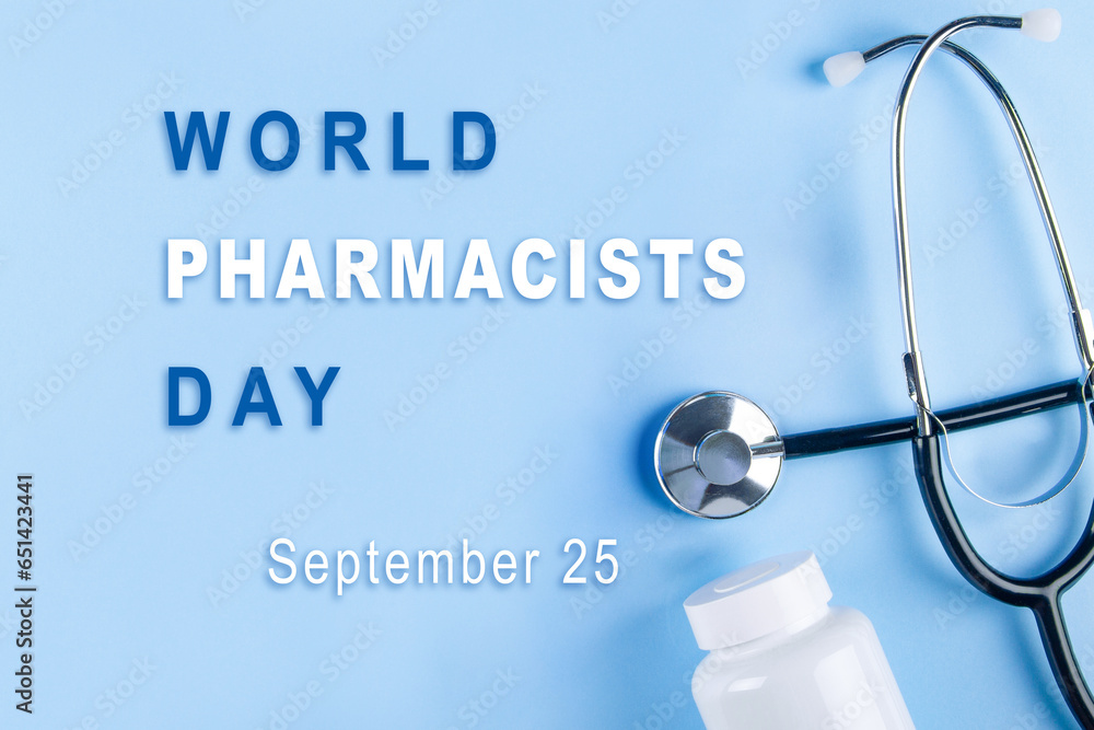 World pharmacists day background with stethoscope and bottle of drug. Annual profession holiday observed on september 25 World pharmacists day background with stethoscope and bottle of drug. Annual profession holiday observed on september 25