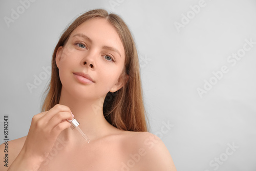 Pretty young woman with cos...