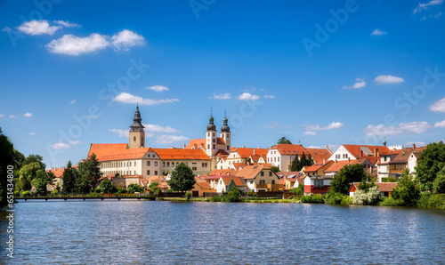 View towards the Castle of Telc in the Czech Republic, with the Name of Jesus Church