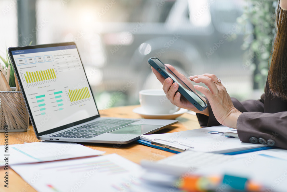 Fototapeta premium Advisor financial business analytics woman analyzing data charts, graphs, and a dashboard on laptop screen. Data analysis concept