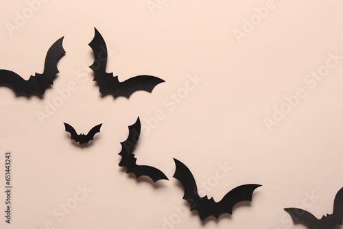 Paper bats for Halloween party on light background © Pixel-Shot