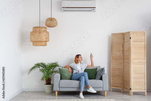Young woman switching on ai...