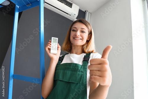 Female technician with air ...