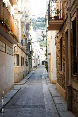 Narrow streets in the old quarter of the Mediterranean town of Blanes in the province of Barcelona, Catalonia, Spain. © Jorge