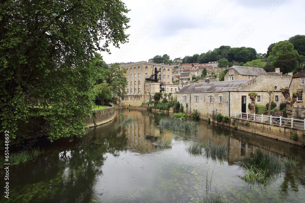 Landscape photo in Bradford-on-Avon,  an English town in Wiltshire. Old buildings along the river Avon.