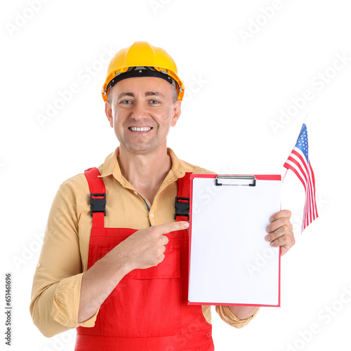 Mature worker pointing at U...