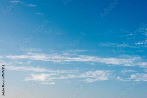 Bright blue sky in daylight. Close up, selective focus. Useful for background designing purpose.