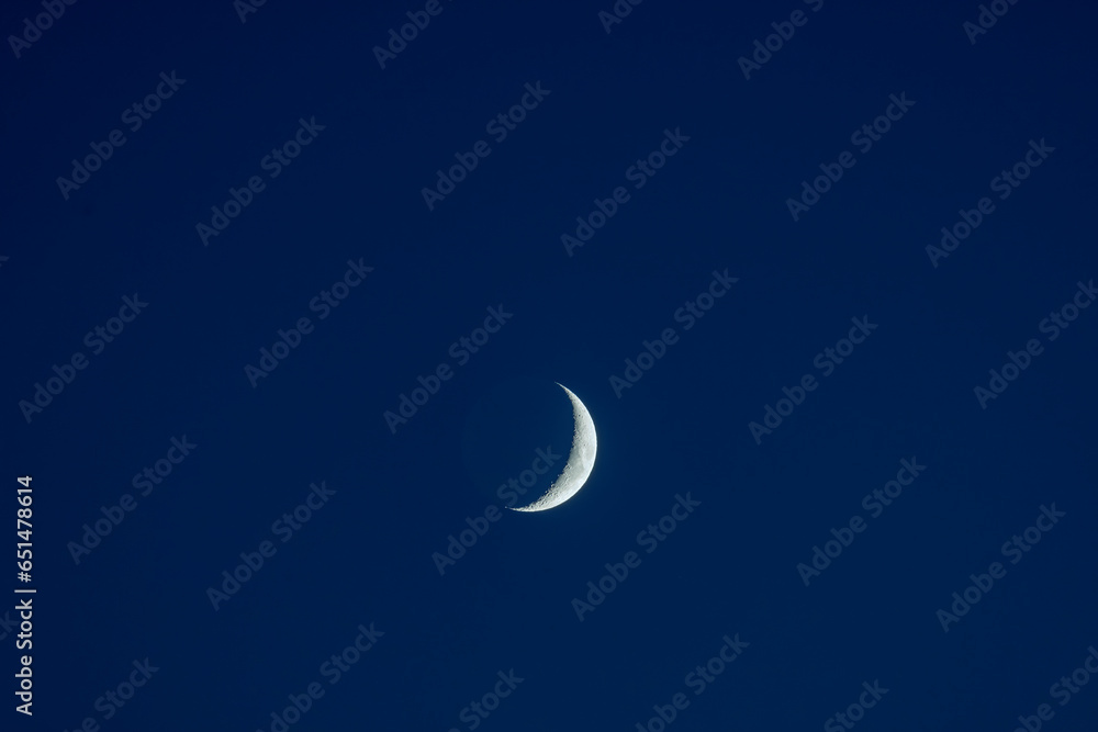 A new moon on a calm night with clear sky A new moon on a calm night with clear sky