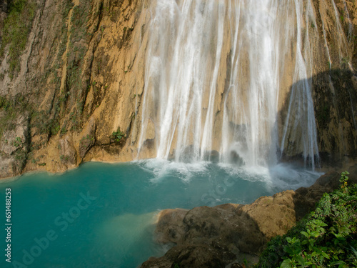Waterfall with crystal clear blue water in the jungle  El-Chiflon  Mexico