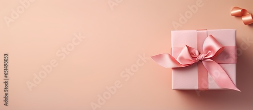 A photographed studio image of a wrapped gift isolated pastel background Copy space © Ilgun