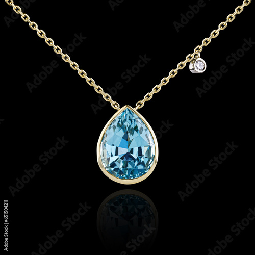 beautiful necklace, gold pendant with diamonds and aquamarine on a black background