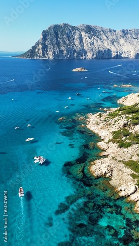Aerial view of the blue pools of Molara island in Sardinia, Italy
