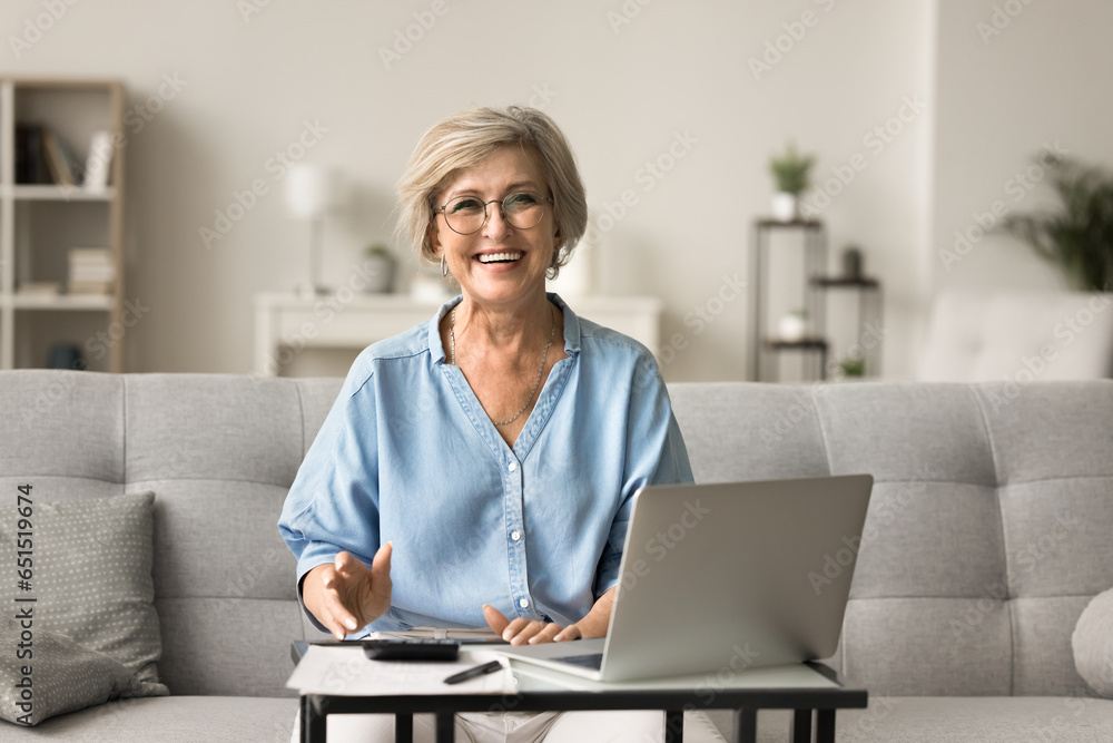Φωτογραφία Happy positive mature old woman in stylish glasses enjoying financial success, s