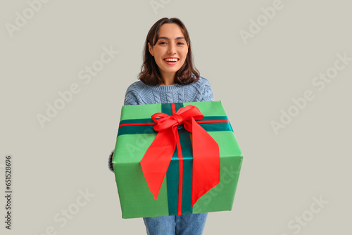 Young woman in warm sweater...