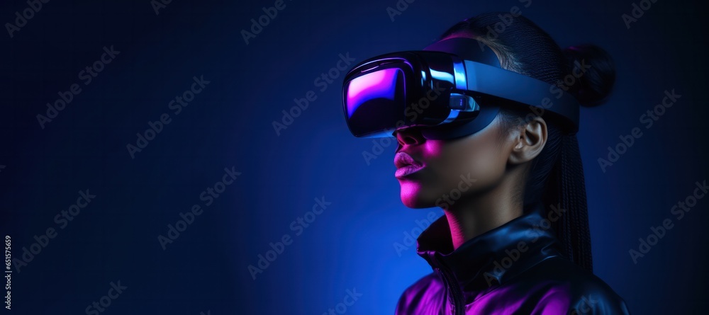 African American woman wearing virtual reality headset neon blue colors horizontal website banner copy space leftt. Diverse girl in VR glasses. Augmented reality and futurist technology concept. African American woman wearing virtual reality headset neon blue colors horizontal website banner copy space leftt. Diverse girl in VR glasses. Augmented reality and futurist technology concept.
